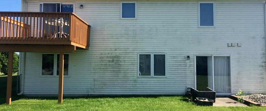 house washing service for pressure washing vinyl siding on house exterior in grand rapids, mi